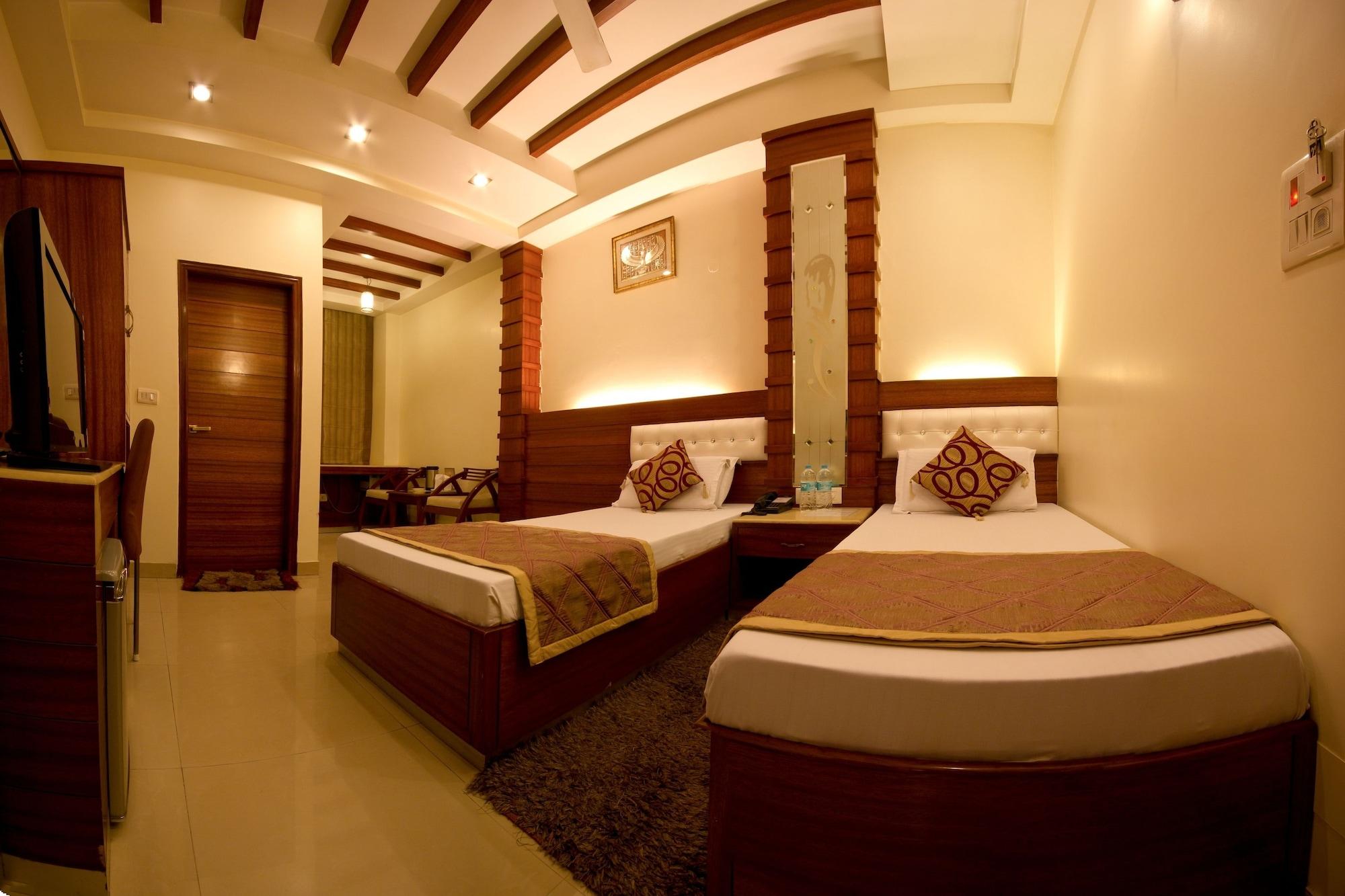 Hotel Aster Inn New Delhi Buitenkant foto
