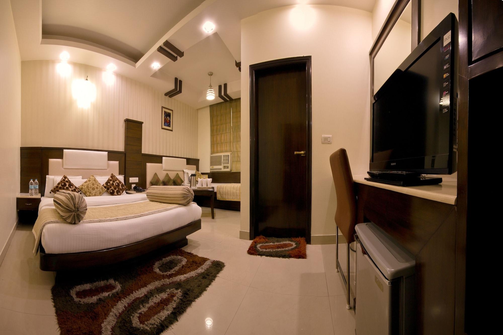 Hotel Aster Inn New Delhi Buitenkant foto