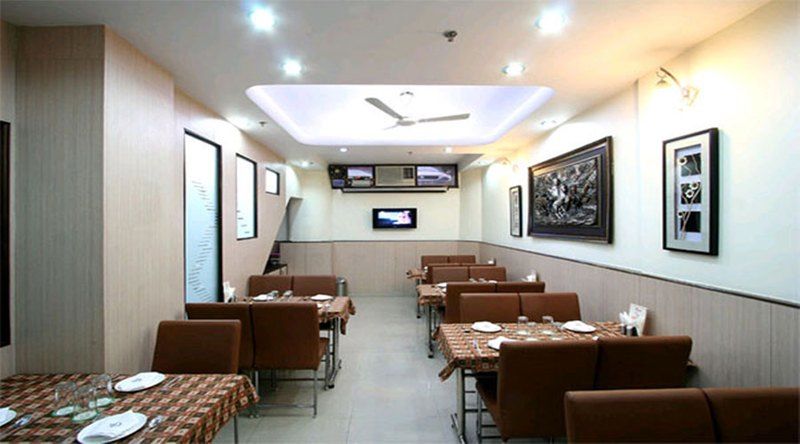 Hotel Aster Inn New Delhi Buitenkant foto