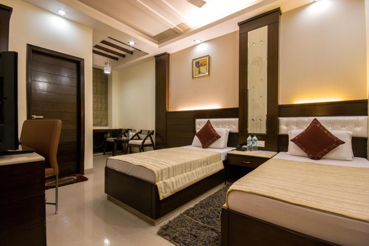 Hotel Aster Inn New Delhi Buitenkant foto